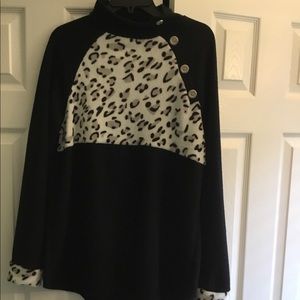 Soft leopard and black mock-neck sweatshirt